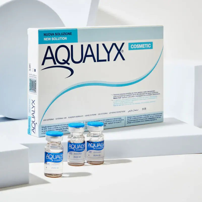 Aqualyx cosmetic packaging with vials on a white background. Aqualyx fat dissolver used for targeting body fat.