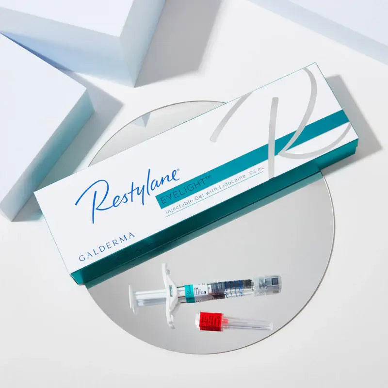 Restylane packaging with syringes on a white background. Treatment for under eyes for hollowing and dark circles. 